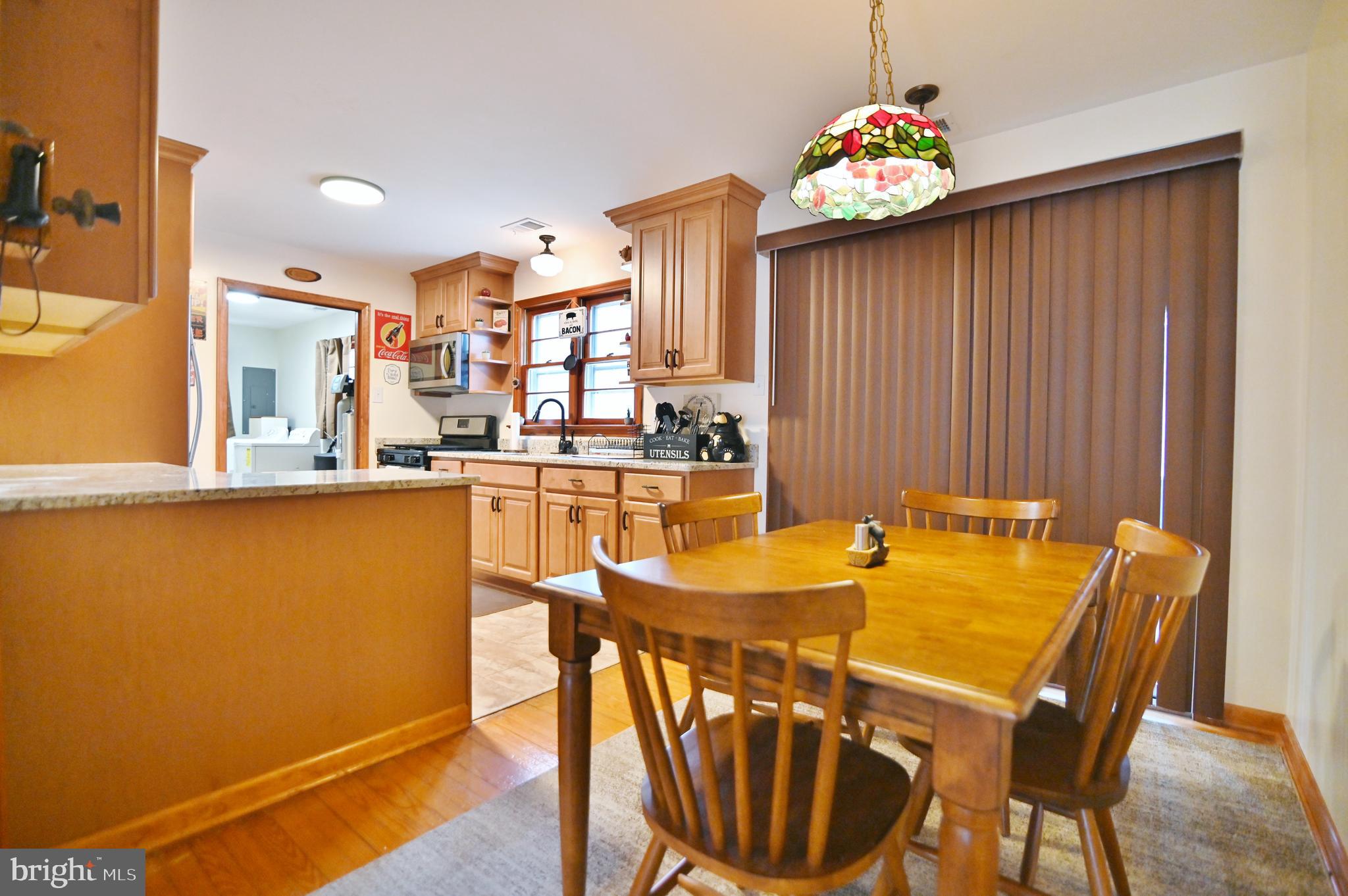 67 Plum Tree Lane Fort Valley, VA 22652 - Photo 27 of 47 a dining room with furniture and window