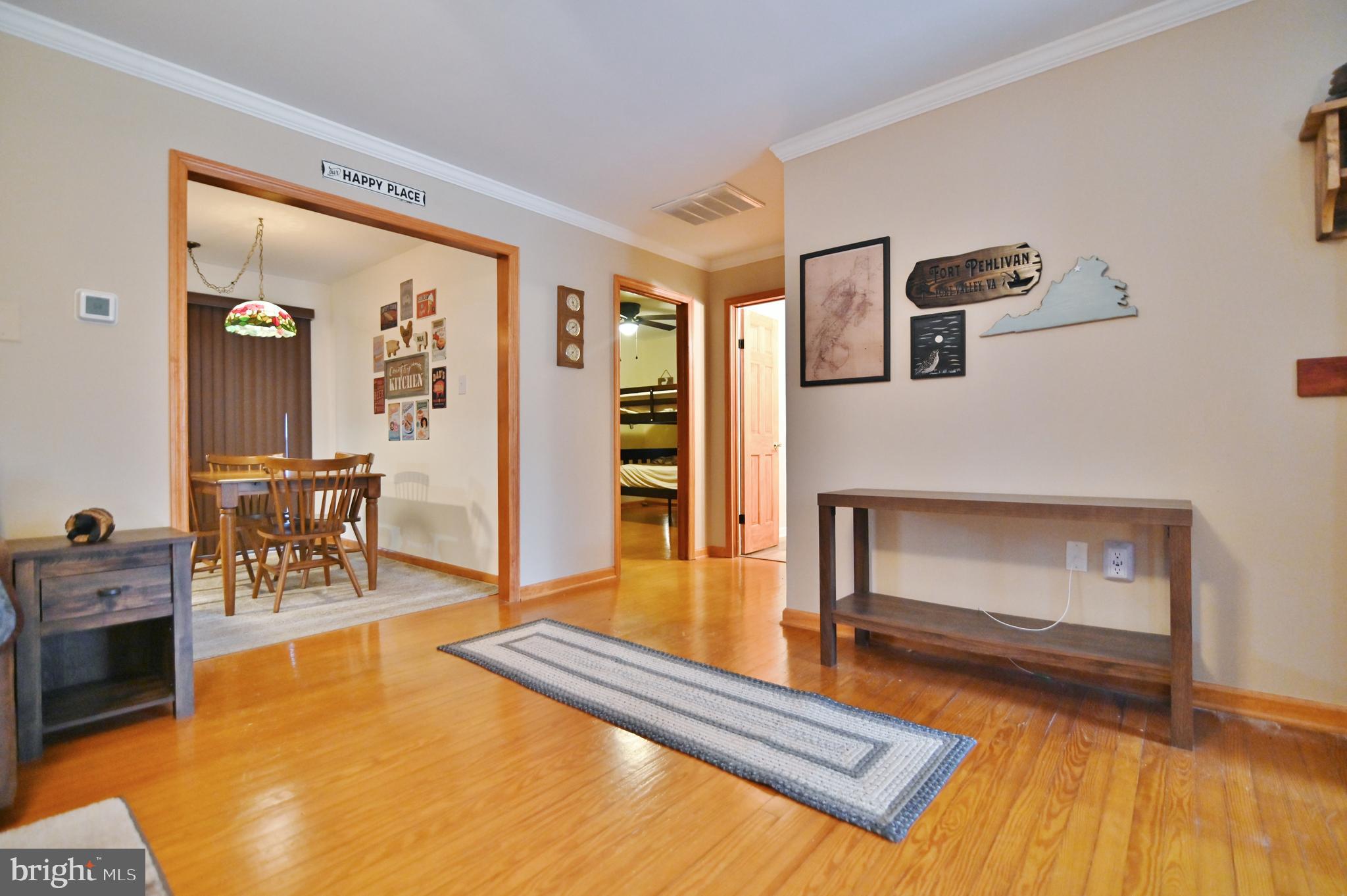 67 Plum Tree Lane Fort Valley, VA 22652 - Photo 32 of 47 a living room with furniture and a fireplace