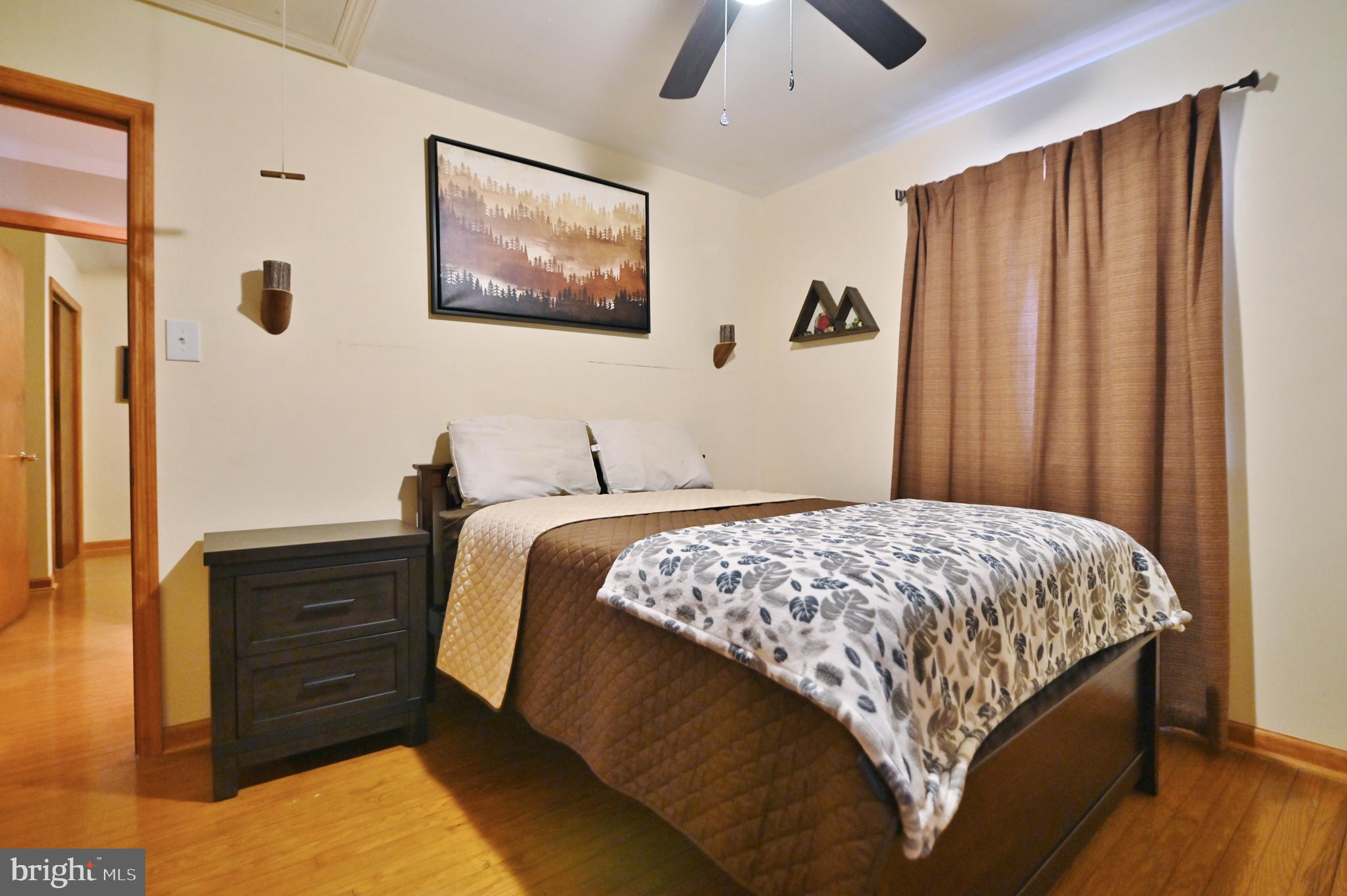 67 Plum Tree Lane Fort Valley, VA 22652 - Photo 33 of 47 a bedroom with a bed and a cabinet