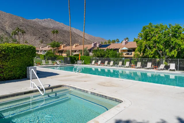 a park view with a bench in a park