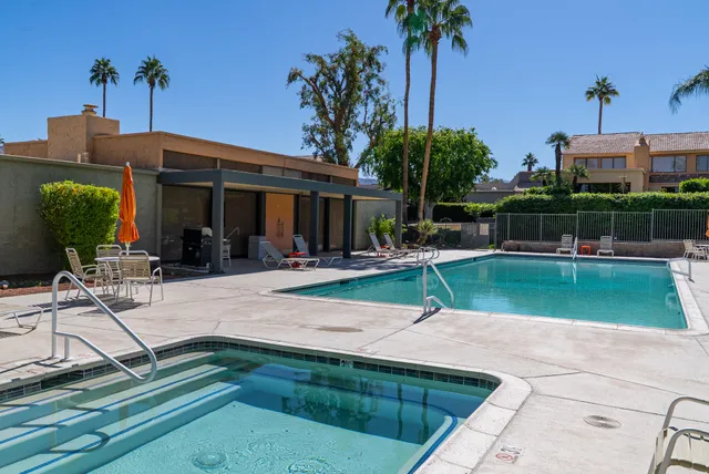 a view of a house with a swimming pool