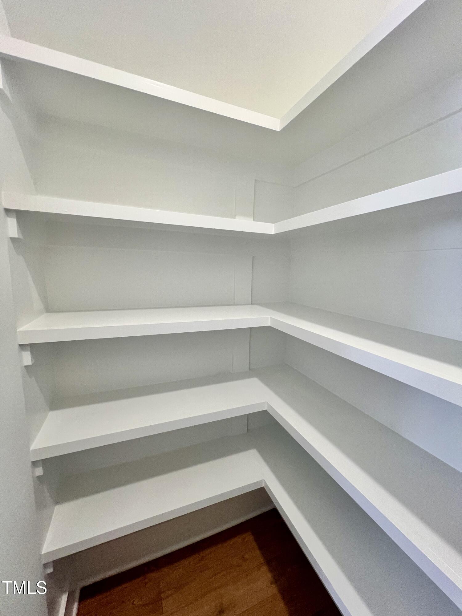 727 Cook Road Durham, NC 27713 - Photo 18 of 50 a storage room with washer and dryer