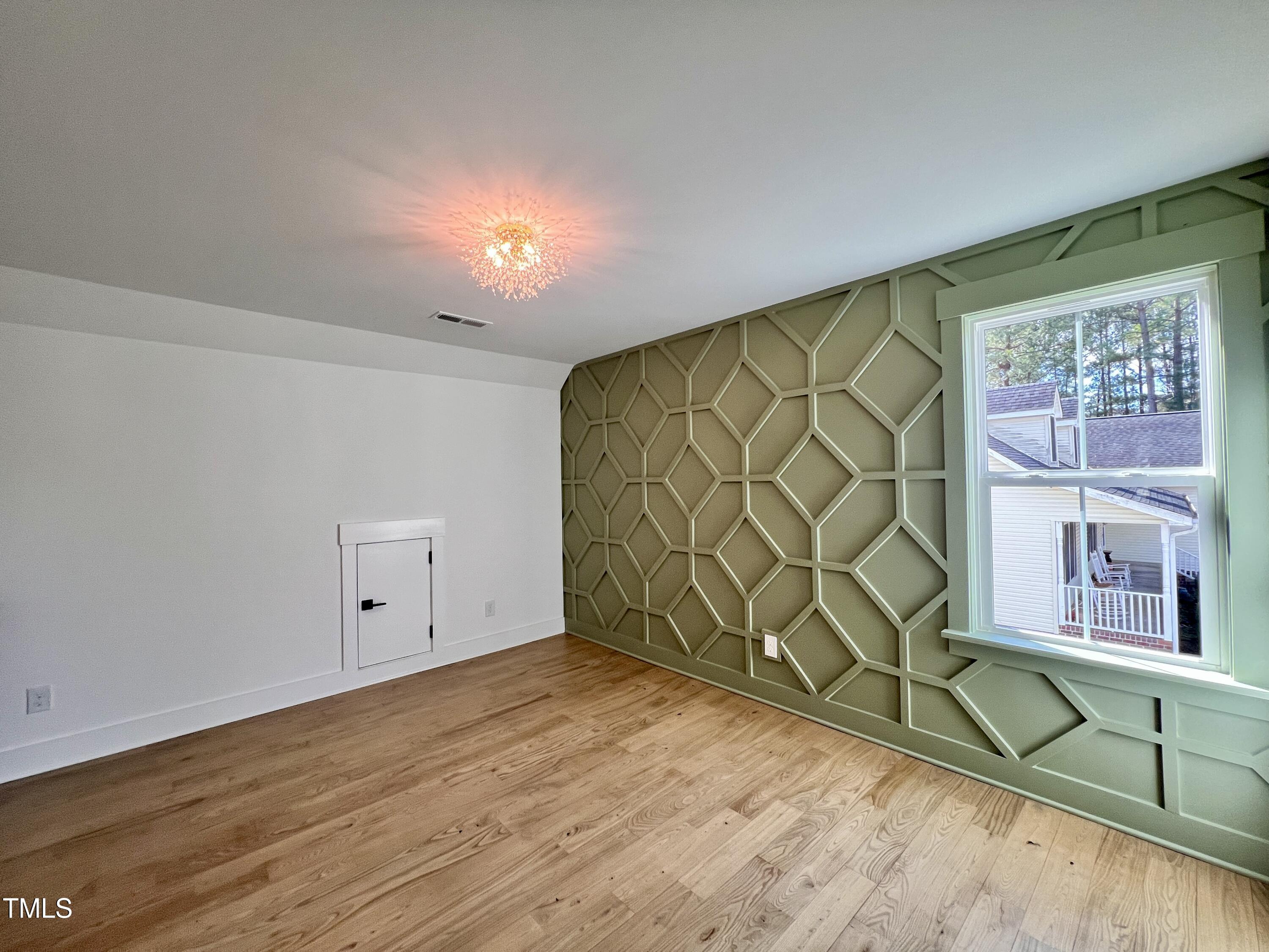 727 Cook Road Durham, NC 27713 - Photo 31 of 50 a view of an entryway with wooden floor