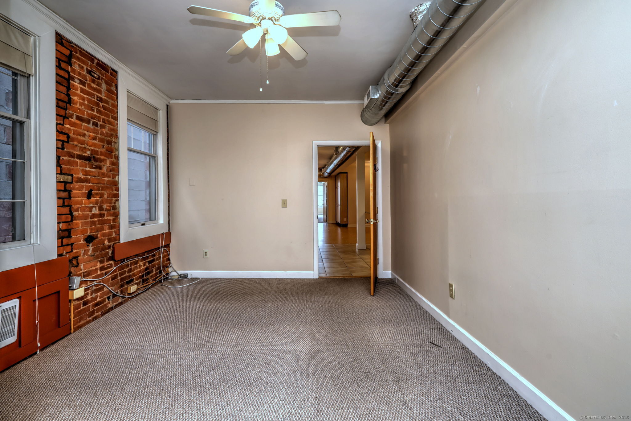 844 Grand Avenue, Unit 2 New Haven, CT 06511 - Photo 29 of 36 a view of an empty room with a window