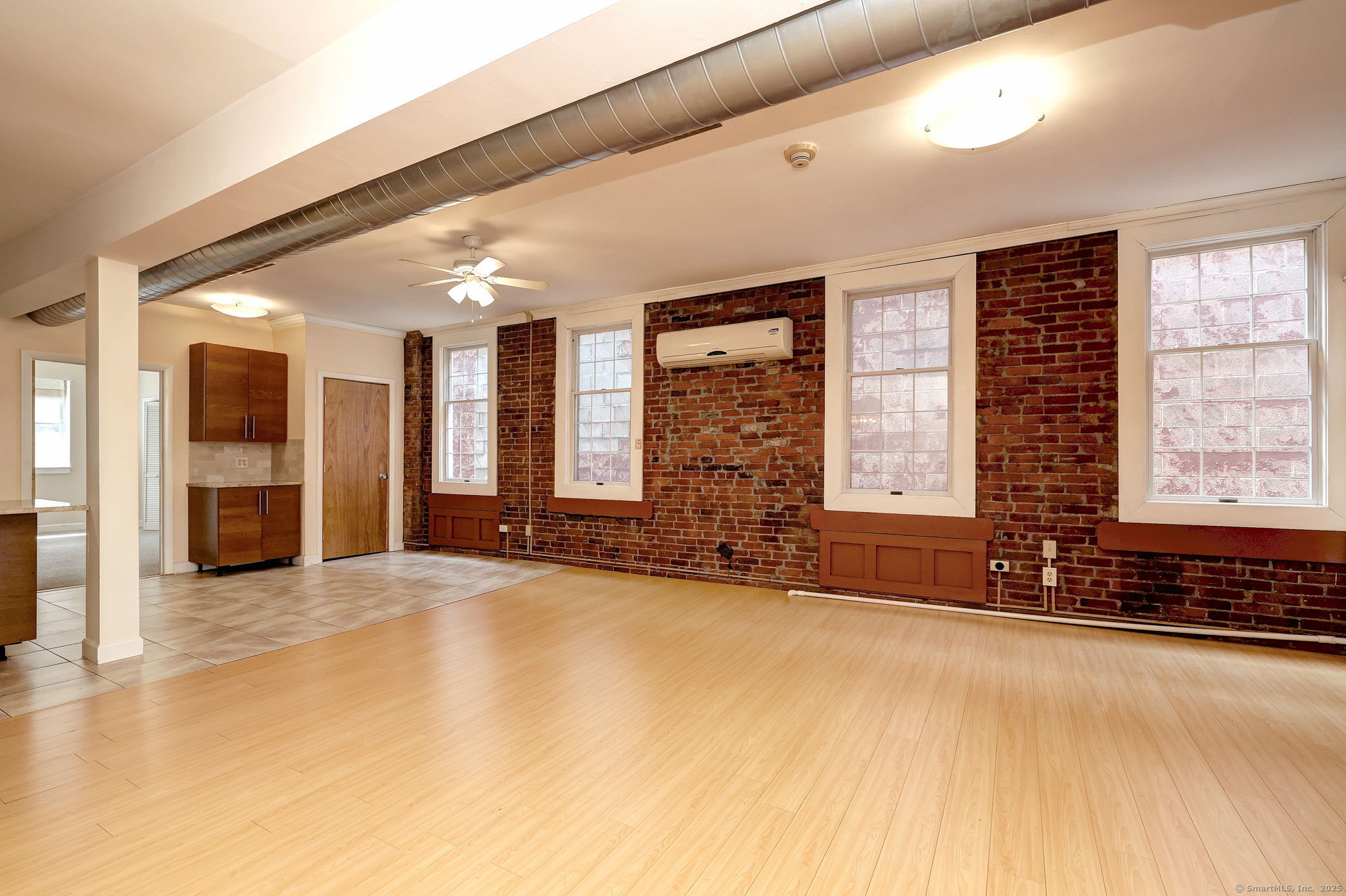844 Grand Avenue, Unit 2 New Haven, CT 06511 - Photo 4 of 36 a view of an empty room with window