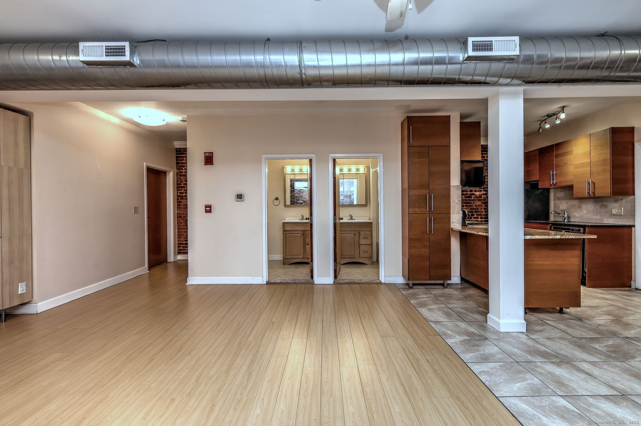 844 Grand Avenue, Unit 2 New Haven, CT 06511 - Photo 8 of 36 a view of a hallway with wooden floor