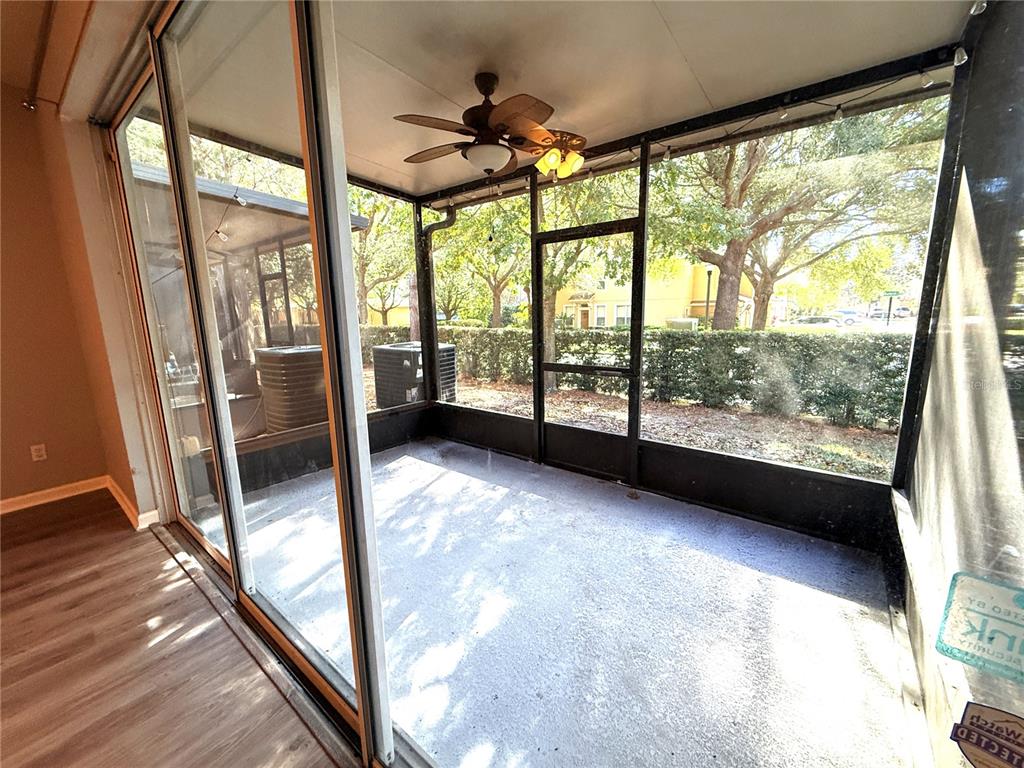 6360 Ranelagh Drive, Unit 104 Orlando, FL 32835 - Photo 18 of 18 a view of an empty room with a large window