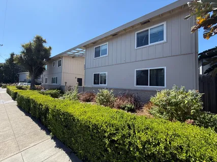 a front view of house with a yard