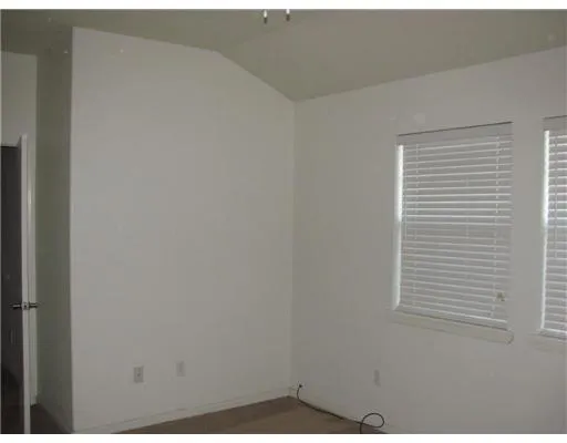 a picture of a bathroom with a window