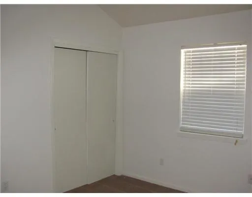 a bathroom with a tub and shower