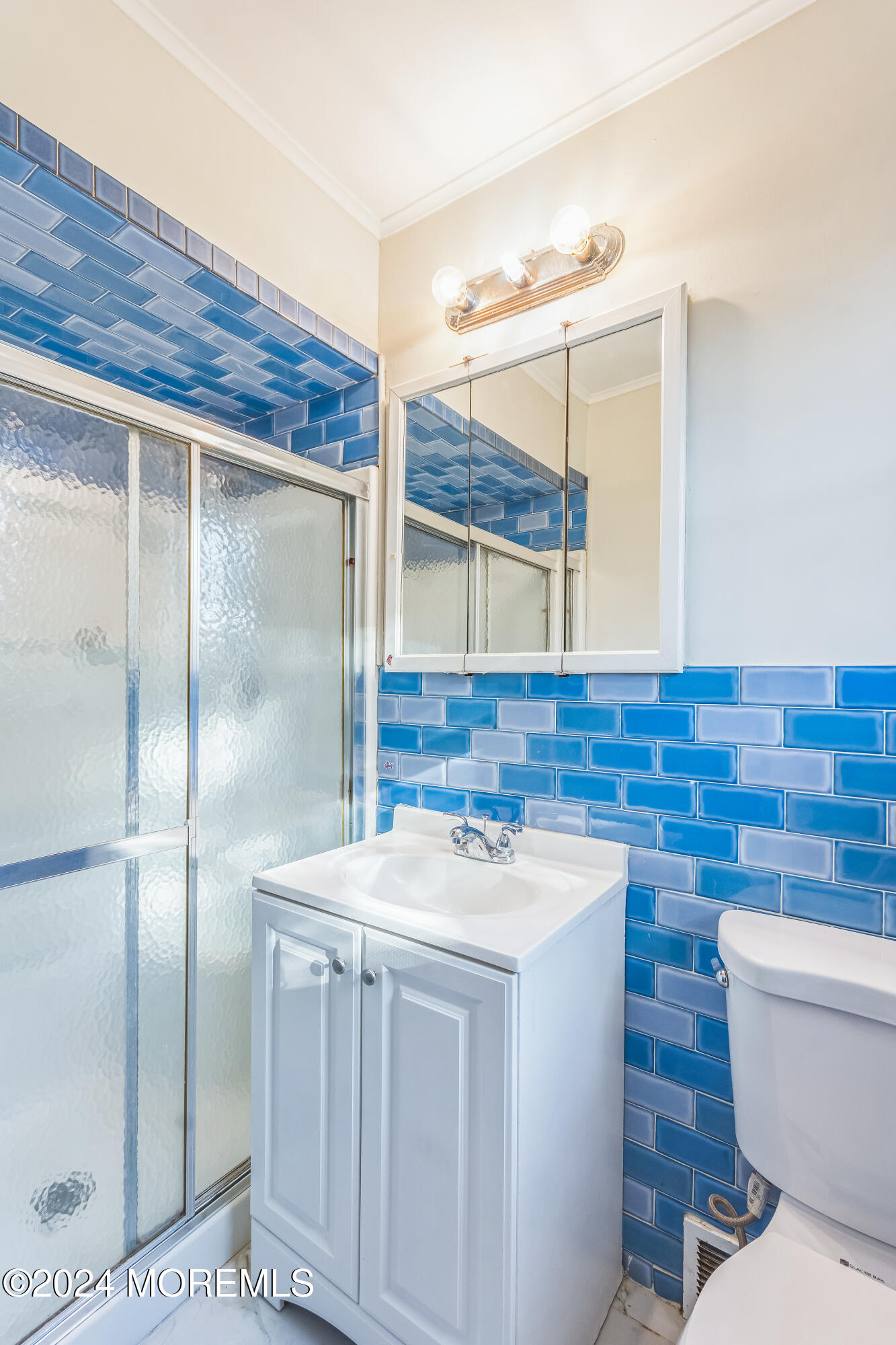 1718 Forge Pond Road Brick, NJ 08724 - Photo 13 of 29 a bathroom with a sink and a toilet