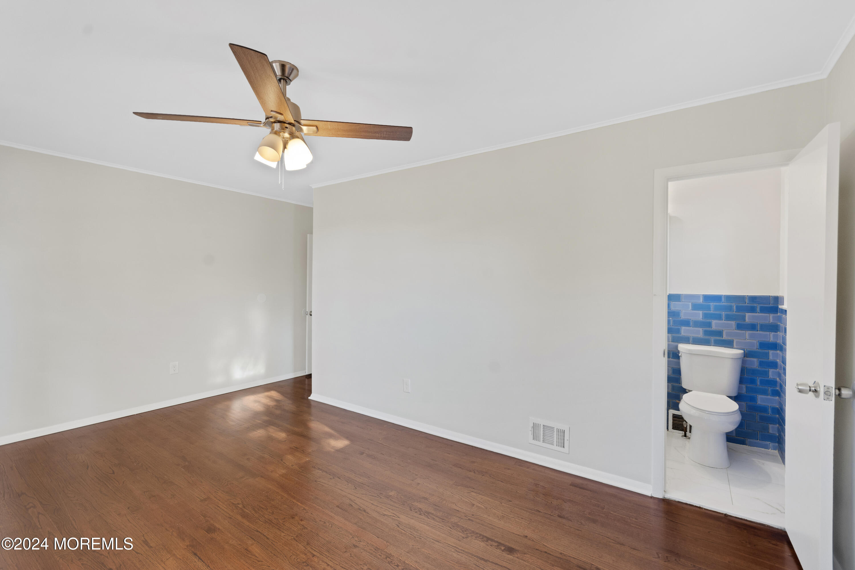 1718 Forge Pond Road Brick, NJ 08724 - Photo 15 of 29 a view of empty room with wooden floor