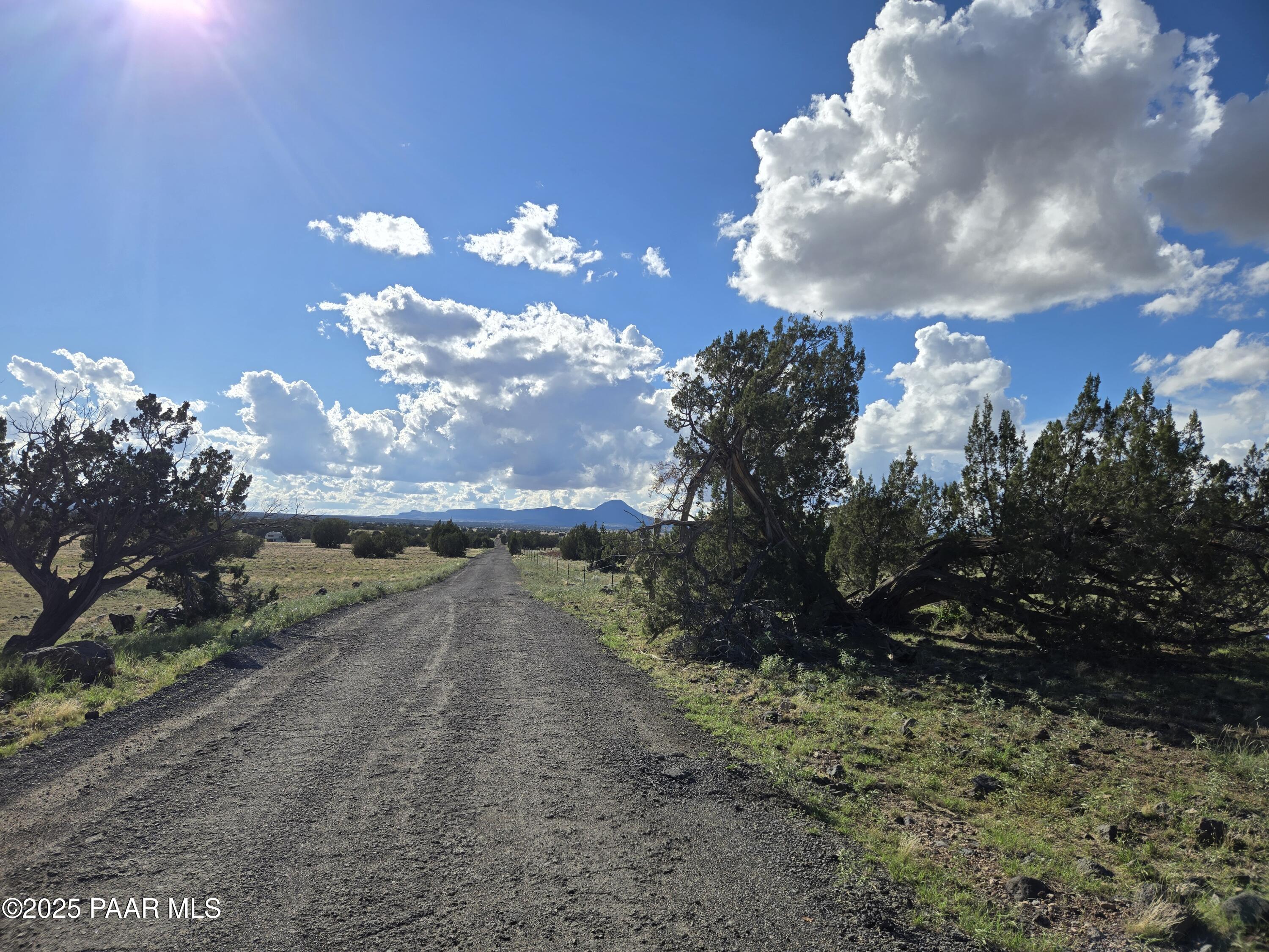 280 A Tanner Road Ash Fork, AZ 86320 - Photo 6 of 8 a view of a lake with a yard