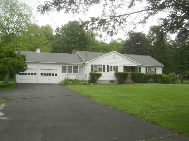 99 Whisconier Road Brookfield, CT 06804 - Photo 1 of 1 a front view of a house with a garden