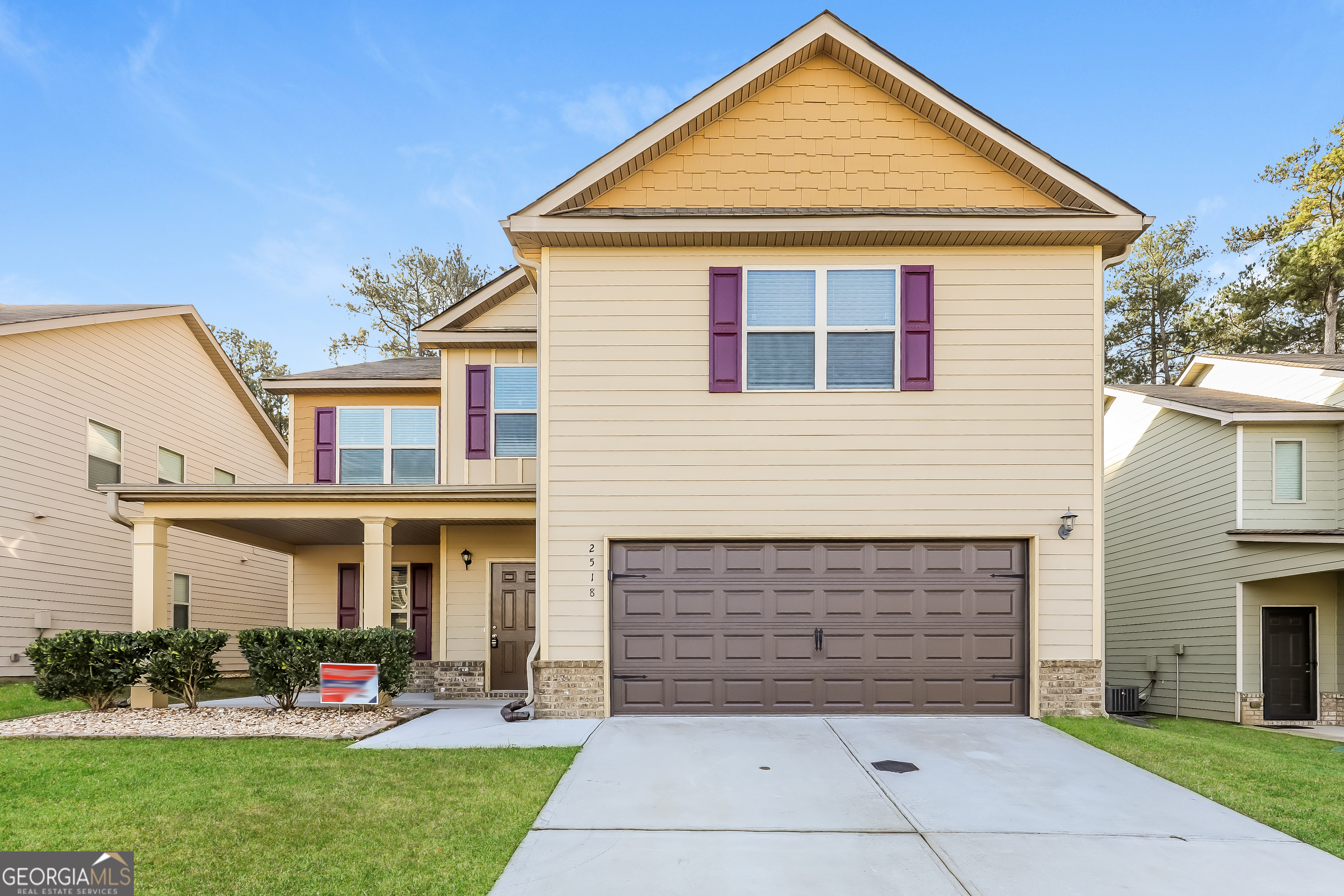 2518 Quincy Loop, Unit 90 Fairburn, GA 30213 - Photo 1 of 15 a front view of house with yard and green space