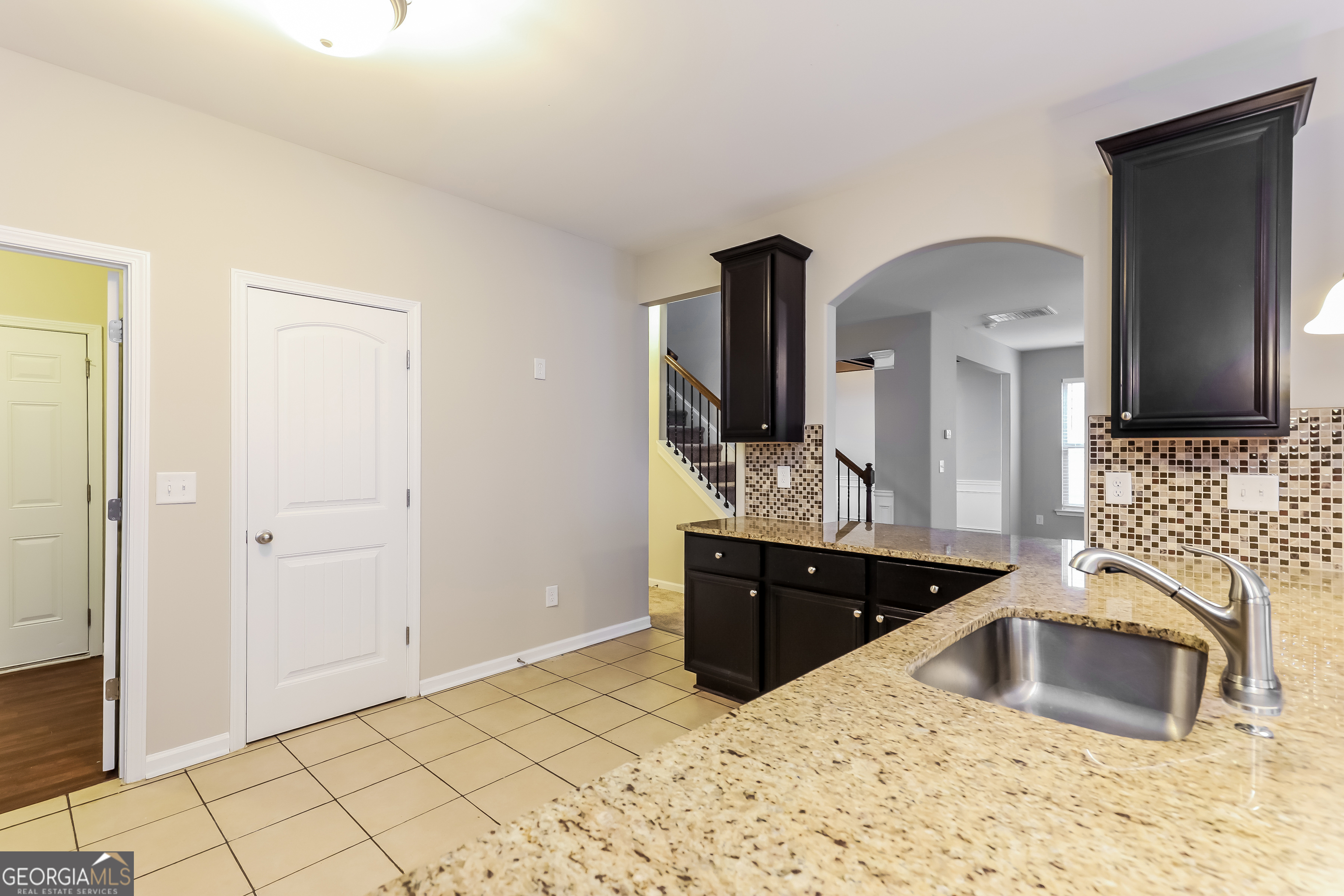 2518 Quincy Loop, Unit 90 Fairburn, GA 30213 - Photo 5 of 15 a large bathroom with a sink and a mirror