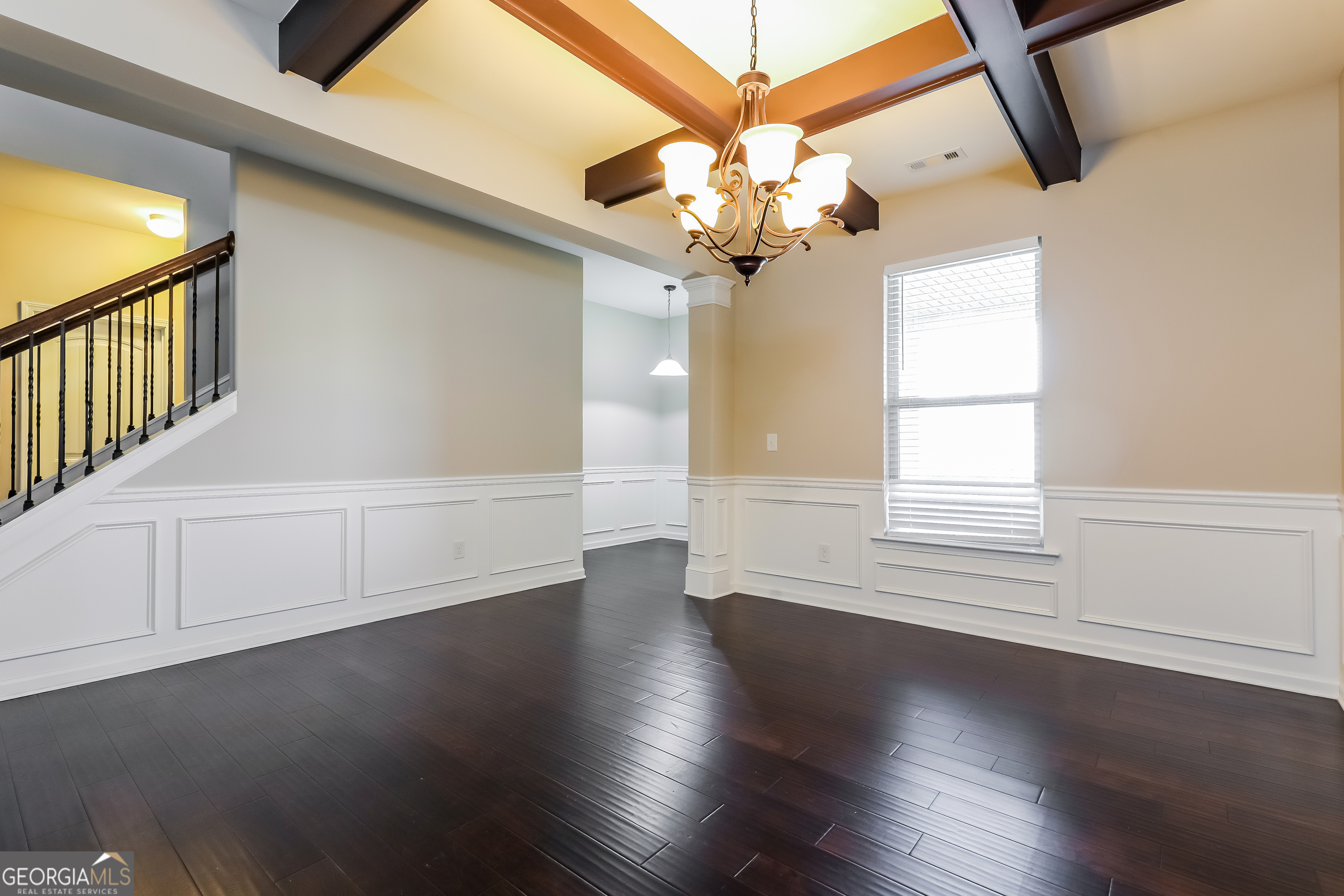 2518 Quincy Loop, Unit 90 Fairburn, GA 30213 - Photo 6 of 15 wooden floor in an empty room with a window