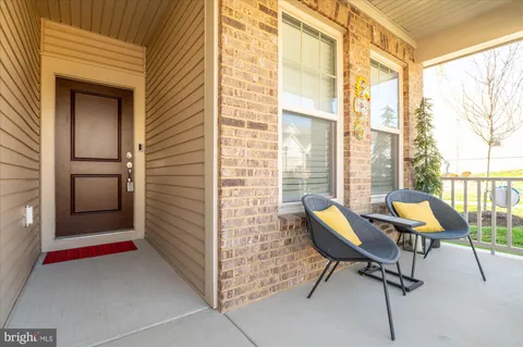a workspace with furniture and a window