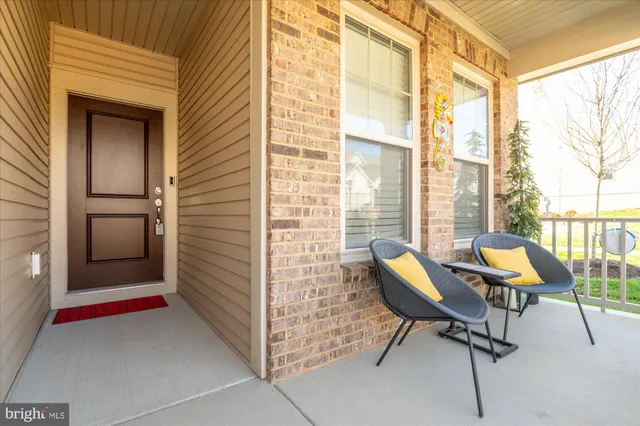 a workspace with furniture and a window