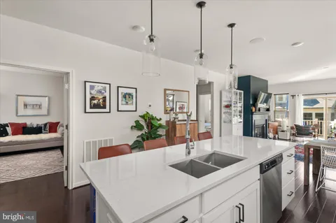 a very nice looking dining room with a table and chairs
