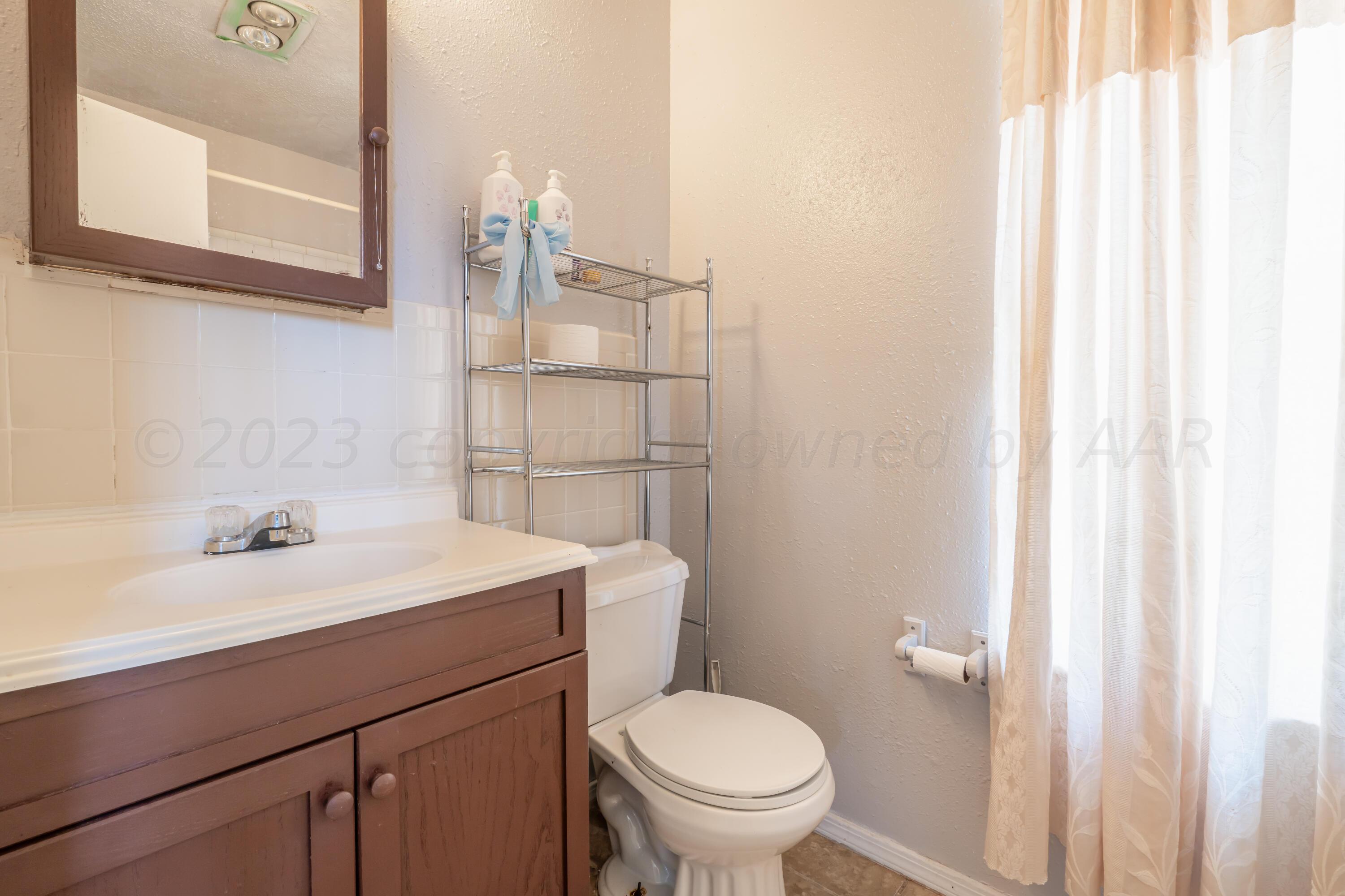 1701 Jasmine Street Amarillo, TX 79107 - Photo 4 of 28 1701 Jasmine-18 PRIMARY BATHROOM