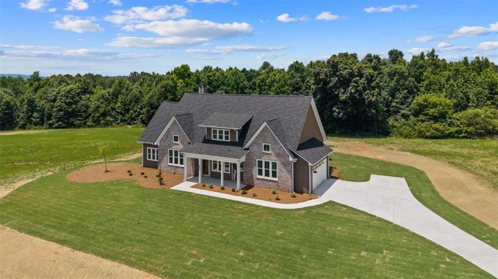 591 Welcome Road Roopville, GA 30170 - Photo 56 of 60 an aerial view of a house