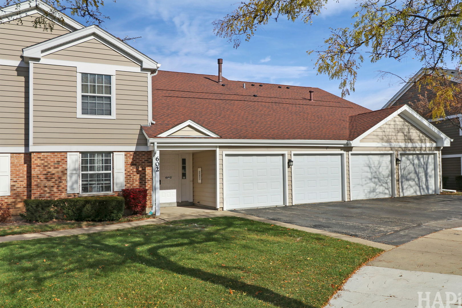 602 Eastview Court, Unit Z1 Schaumburg, IL 60194 - Photo 1 of 19 a view of a house with a yard