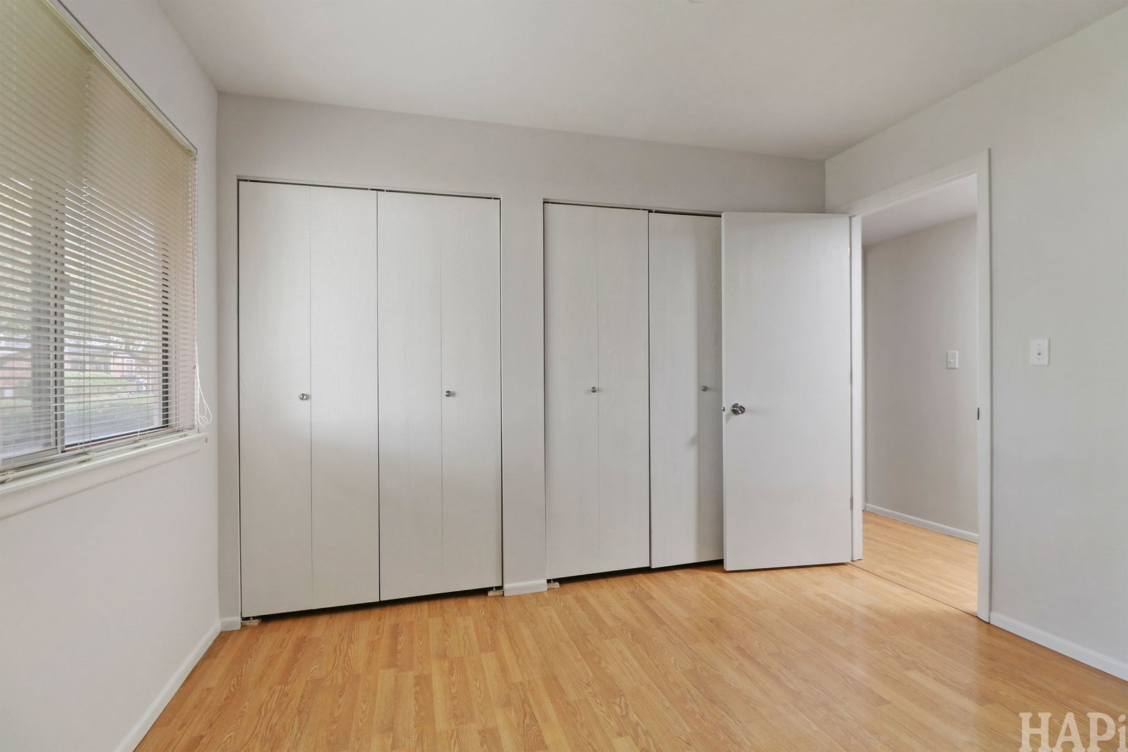 602 Eastview Court, Unit Z1 Schaumburg, IL 60194 - Photo 11 of 19 a view of an empty room with wooden floor