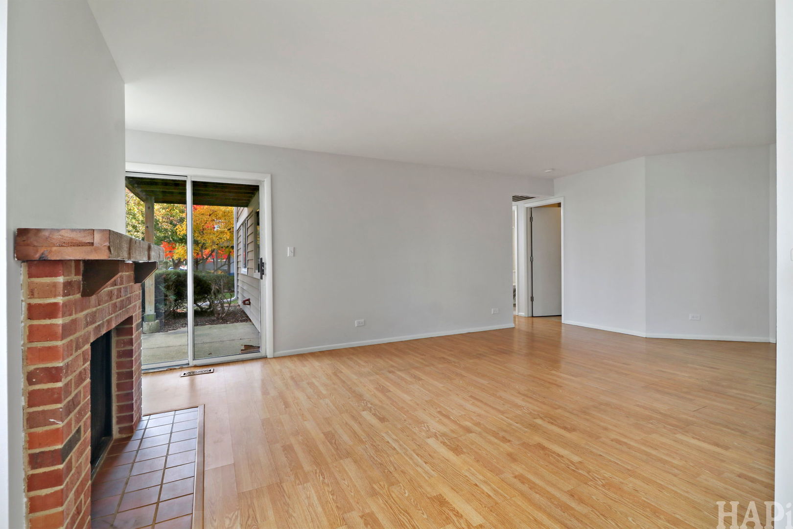 602 Eastview Court, Unit Z1 Schaumburg, IL 60194 - Photo 4 of 19 a view of livingroom with furniture wooden floor and window
