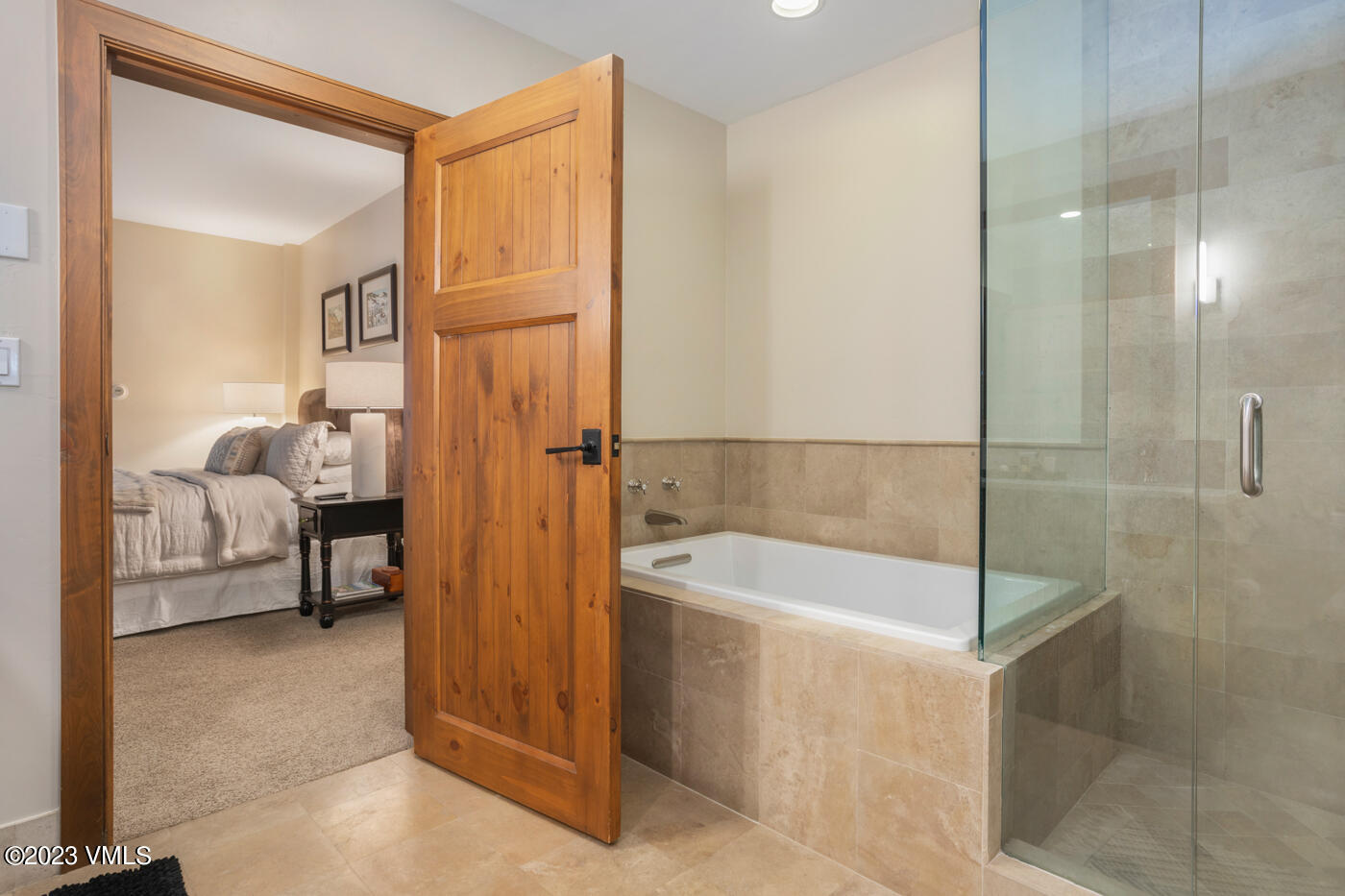 180 Daybreak Ridge Road, Unit 309 Avon, CO 81620 - Photo 22 of 27 a spacious bathroom with a tub shower and sink