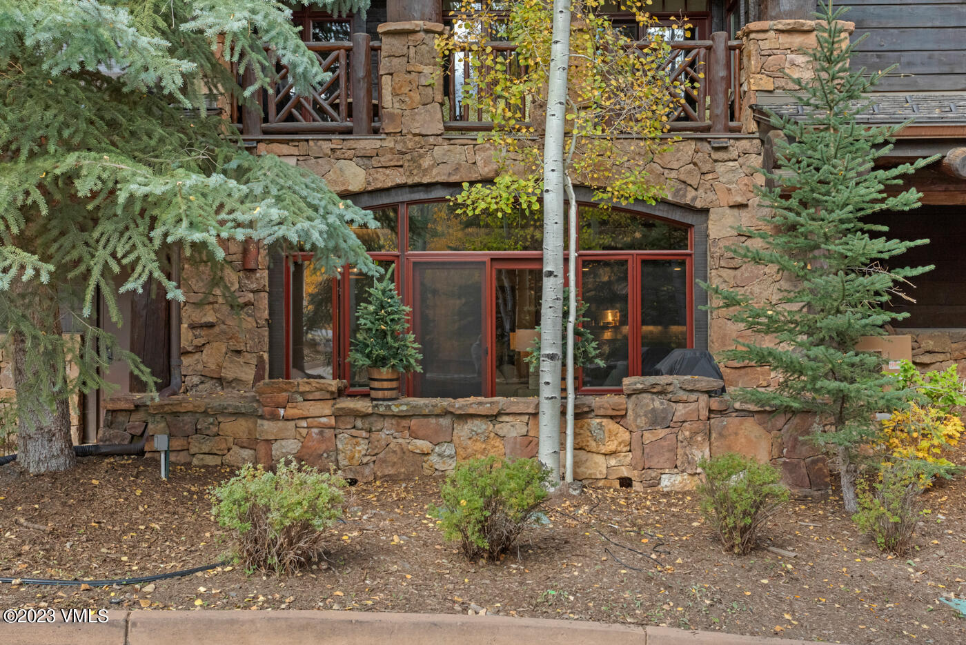 180 Daybreak Ridge Road, Unit 309 Avon, CO 81620 - Photo 23 of 27 a view of a house with small garden