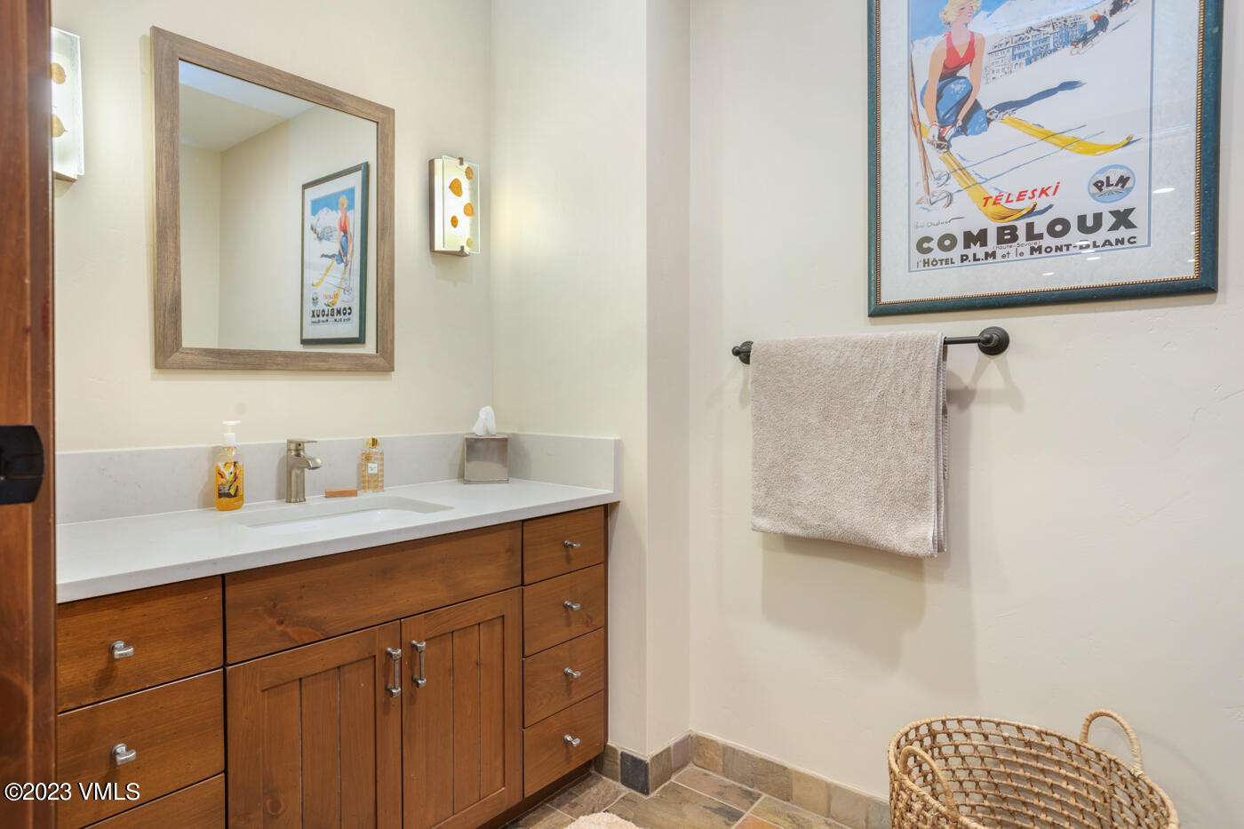 180 Daybreak Ridge Road, Unit 309 Avon, CO 81620 - Photo 27 of 27 a bathroom with a sink and a mirror
