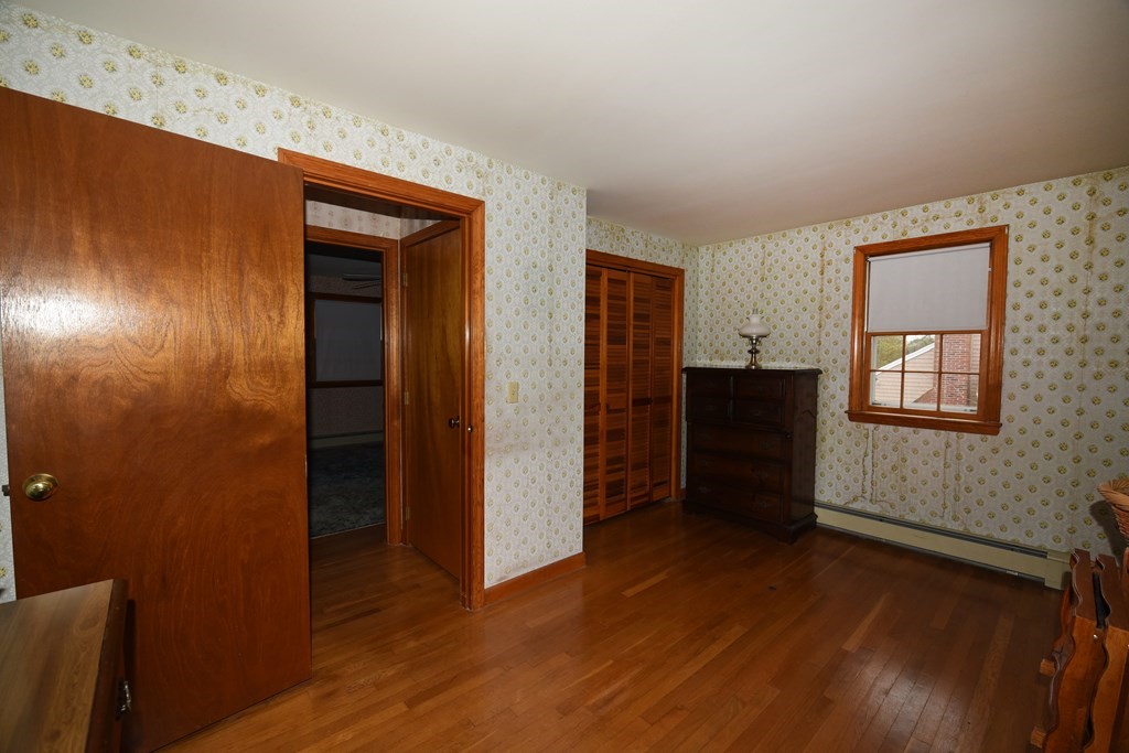 21 Whitehaven Way Dennis, MA 02660 - Photo 28 of 35 an empty room with wooden floor and closet