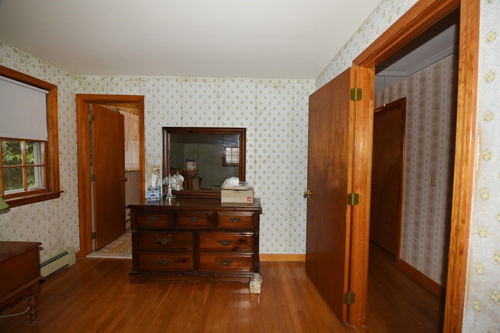 21 Whitehaven Way Dennis, MA 02660 - Photo 29 of 35 a room with a table and a mirror