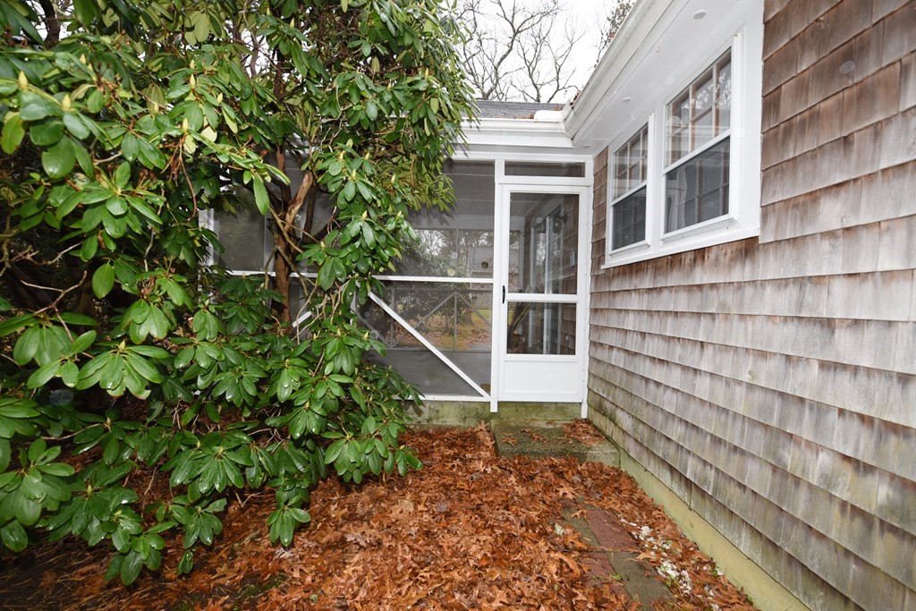 21 Whitehaven Way Dennis, MA 02660 - Photo 7 of 35 a backyard of a house with lots of green space