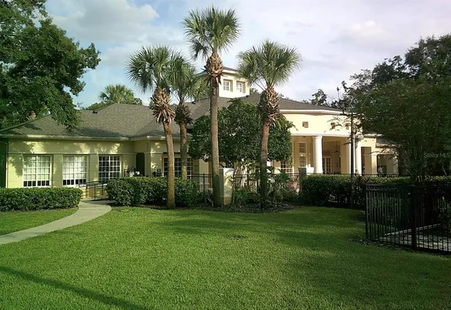 a front view of a building with garden