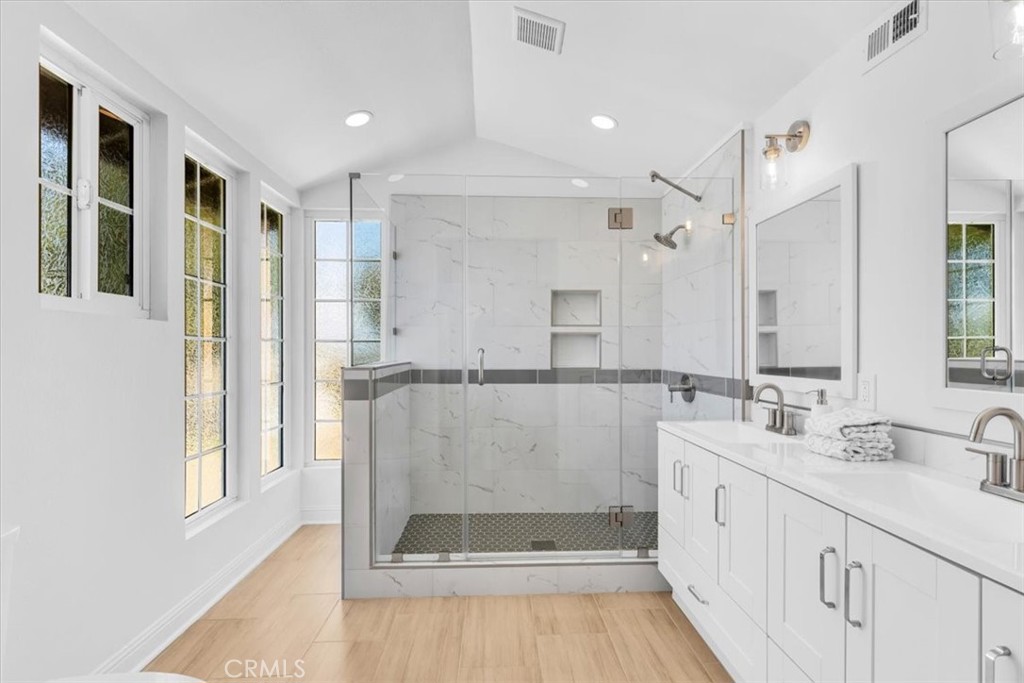 3315 Hawkwood Road Diamond Bar, CA 91765 - Photo 32 of 64 Primary bath with custom shower enclosure, new counter tops and lights