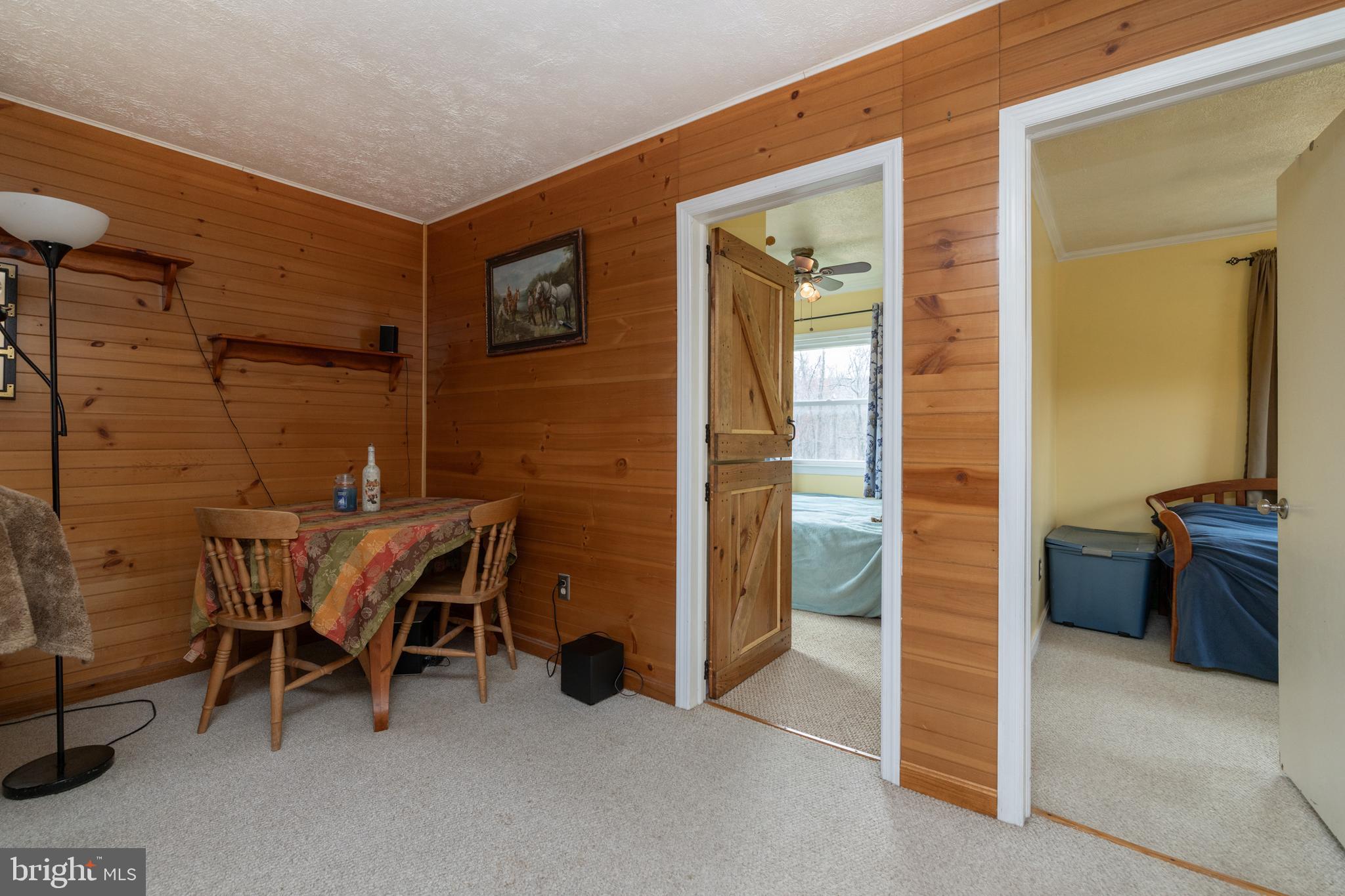 411 Mountain Lake Drive Front Royal, VA 22630 - Photo 19 of 38 a patio with table and chairs