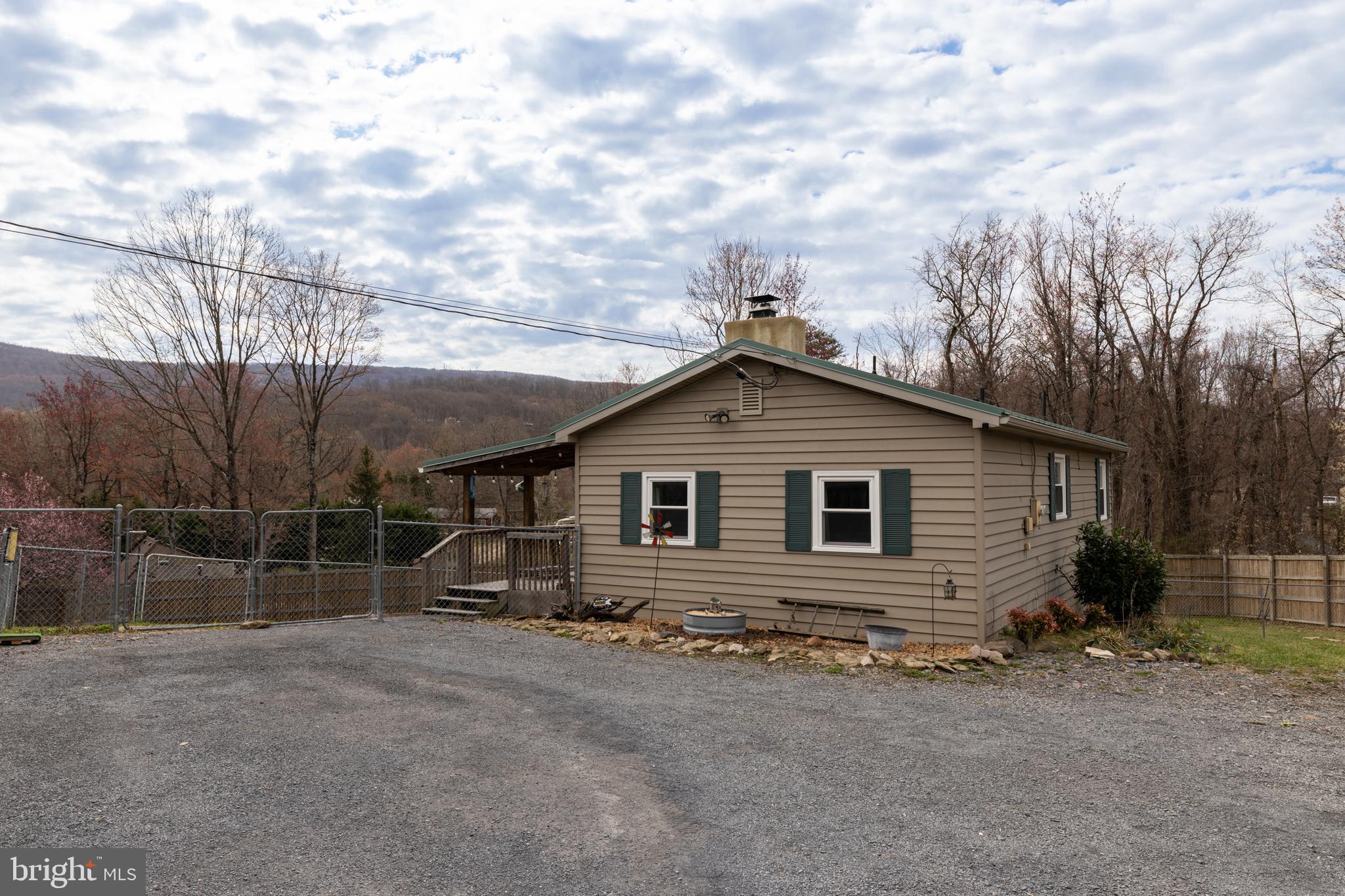 411 Mountain Lake Drive Front Royal, VA 22630 - Photo 26 of 38 a view of backyard of house