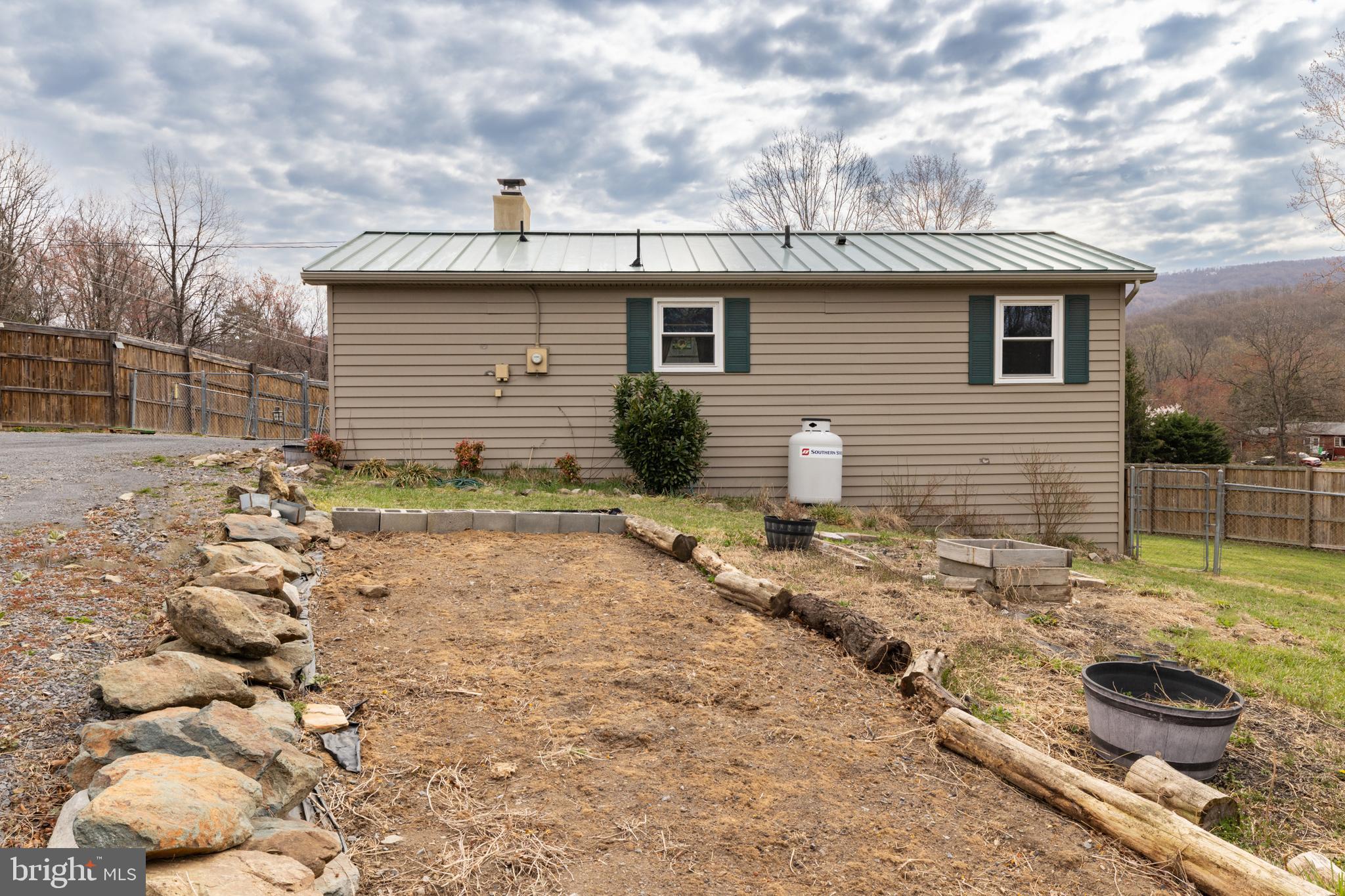 411 Mountain Lake Drive Front Royal, VA 22630 - Photo 28 of 38 a view of a house with a yard