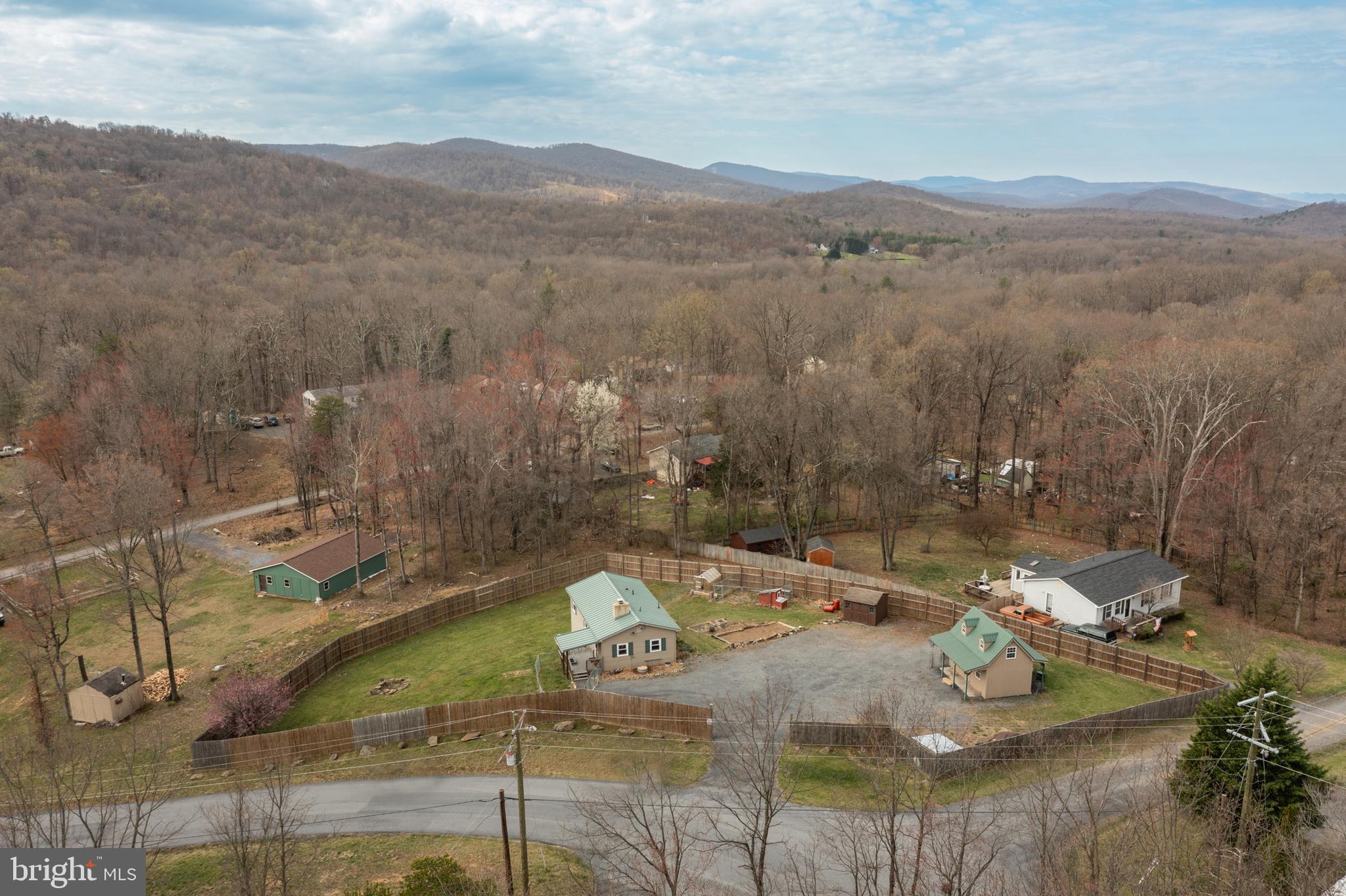 411 Mountain Lake Drive Front Royal, VA 22630 - Photo 34 of 38 swimming pool view with mountain view