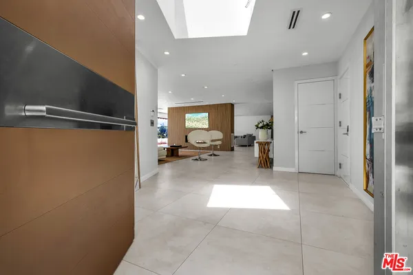 a view of living room with a large window