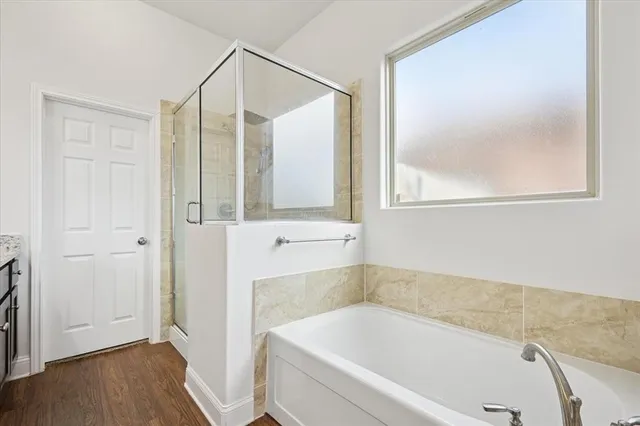a bathroom with a sink double vanity and a mirror