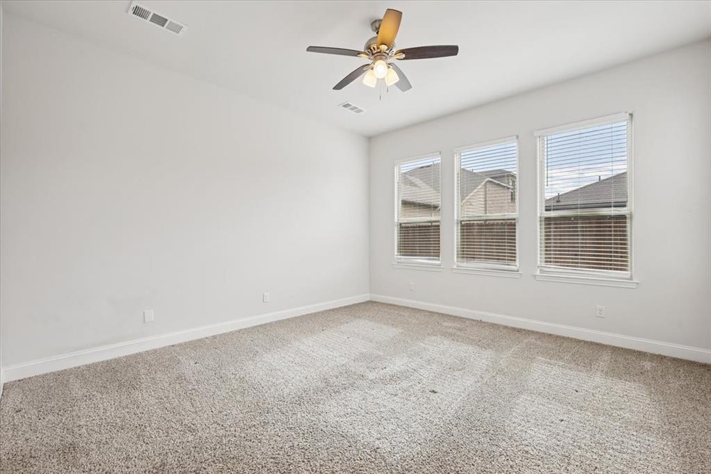 313 Marble Creek Drive Fort Worth, TX 76131 - Photo 21 of 27 a view of empty room with ceiling fan