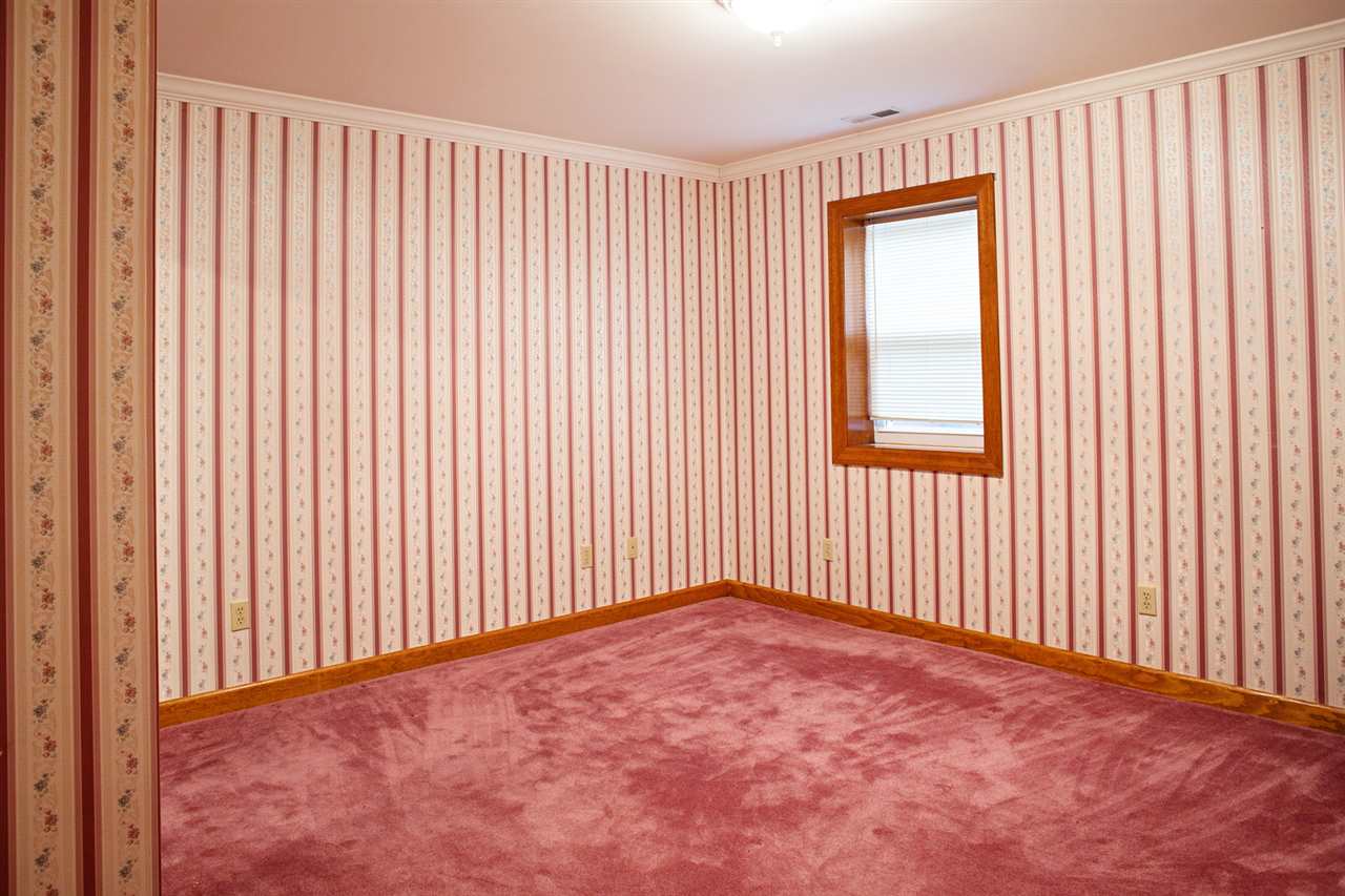 6820 West Spring Road Oregon, IL 61061 - Photo 15 of 24 an empty room with a window