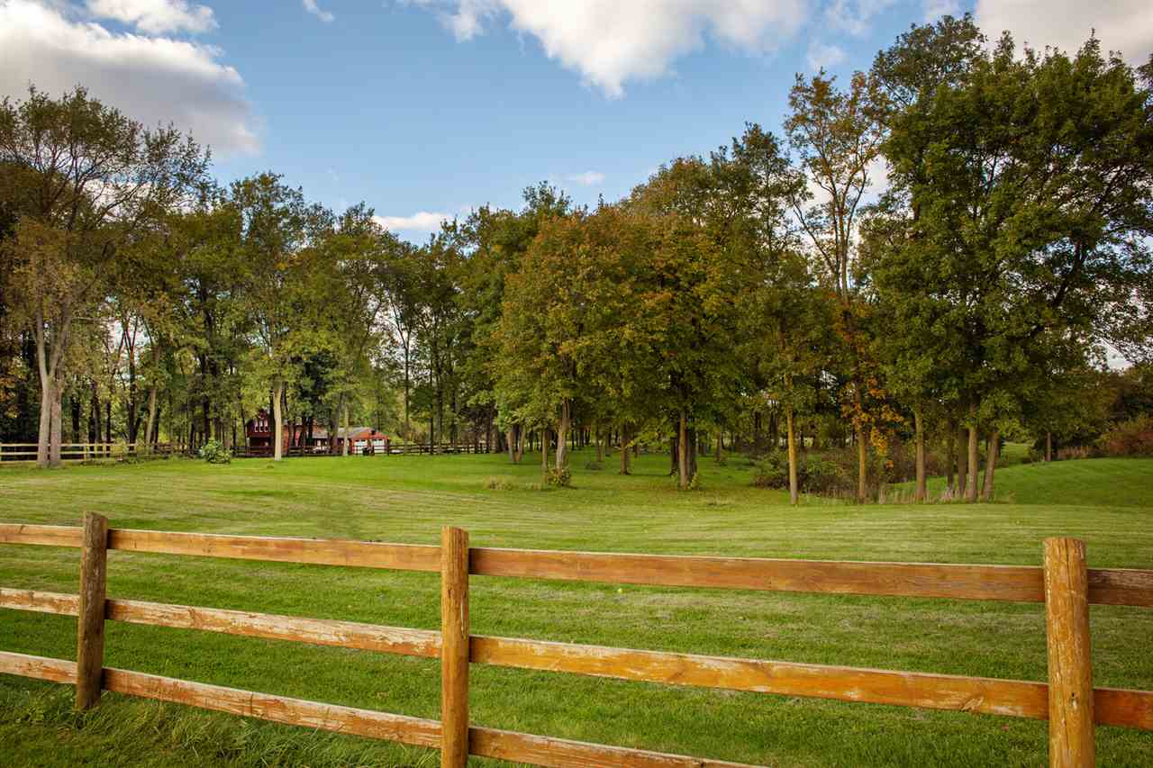 6820 West Spring Road Oregon, IL 61061 - Photo 23 of 24 a view of a park with large trees
