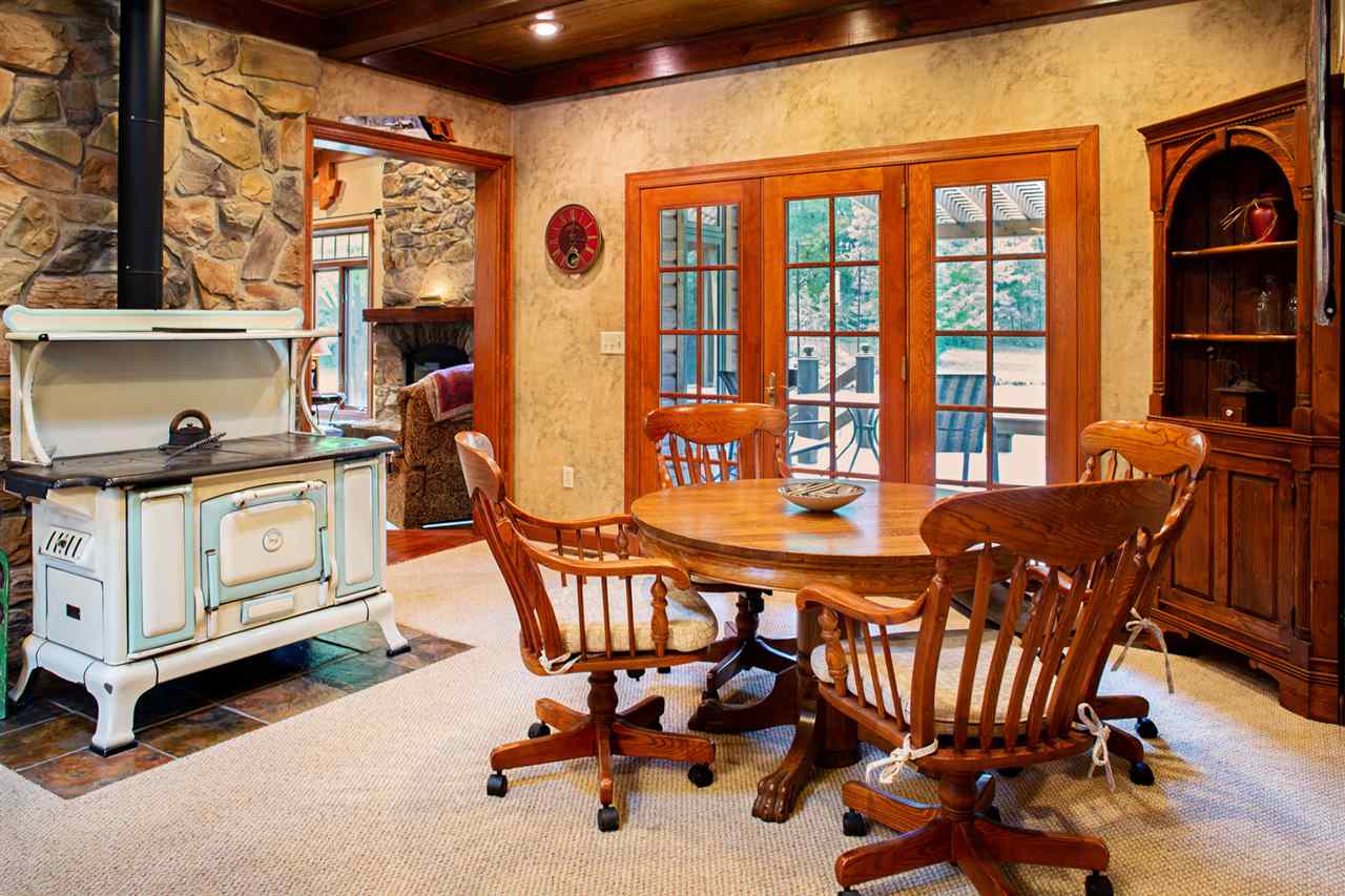 6820 West Spring Road Oregon, IL 61061 - Photo 8 of 24 a view of a dining room with furniture window and outside view