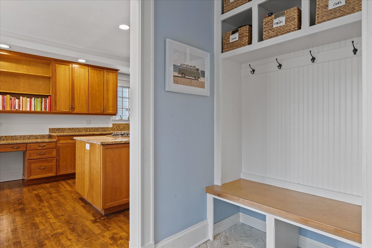 615 Abbotsford Road Kenilworth, IL 60043 - Photo 19 of 47 a view of cabinets with wooden floor