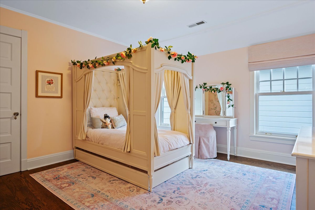 615 Abbotsford Road Kenilworth, IL 60043 - Photo 31 of 47 a view of a bedroom with baby crib and front door