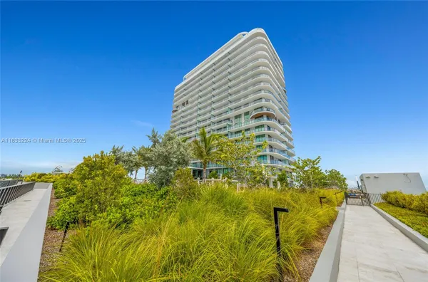 a view of a multi story residential apartment building